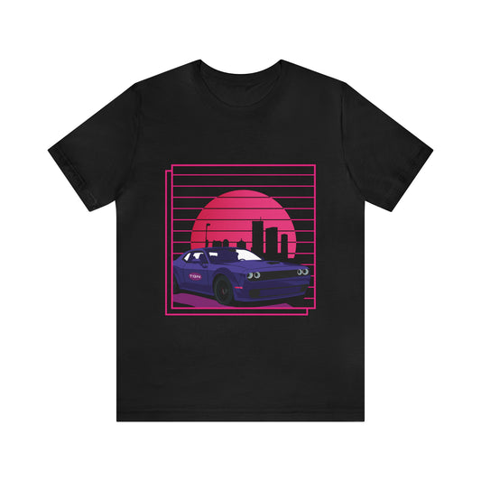 Black T-Shirt featuring a classic muscle car against a retro sunset cityscape. Taken from the TEQNEON Retro Classics collection