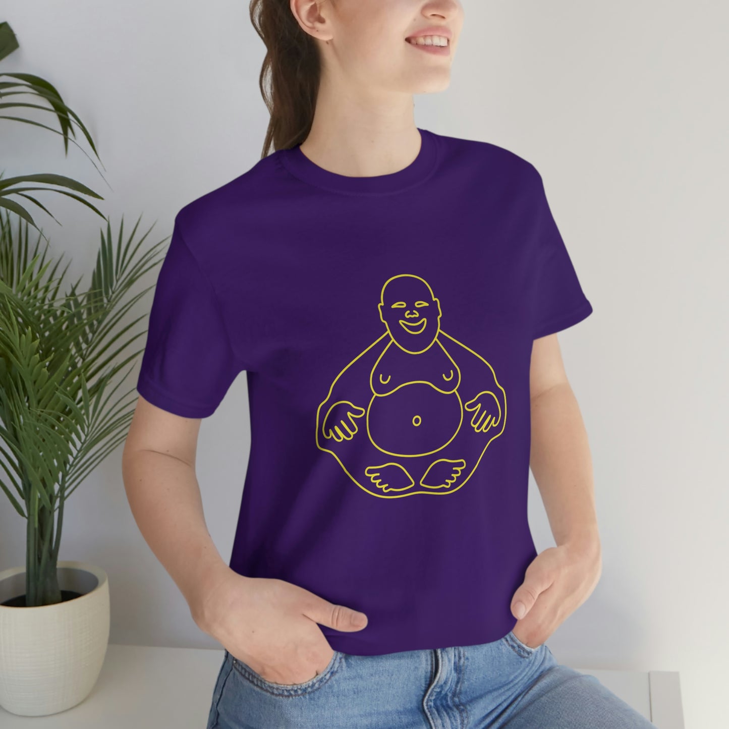 Purple T-Shirt featuring a yellow 'Laughing Buddha' design from the TEQNEON Ha Ha Land collection, exuding joy and humour